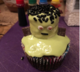 Frankenstein Halloween-themed cupcake.