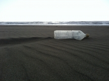 Plastic bottle on a beach.