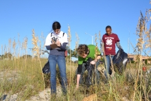 Students collecting data during the Mississippi Coastal Cleanup.