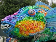 A sculpture of a parrotfish made of marine debris.