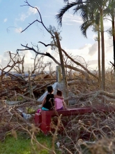 Two sisters observe the aftermath of Typhoon Yutu in the Mariana Islands (Photo: Micronesia Islands Nature Alliance).