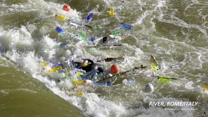 Plastic debris in a rushing river.