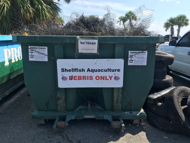 Dumpster used for aquaculture debris