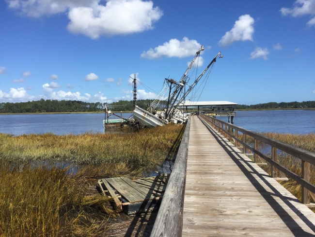 Vessels and dock debris from hurricane Matthew lodged into a dock in Georgia.