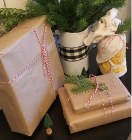 Gifts wrapped in repurposed grocery bags.