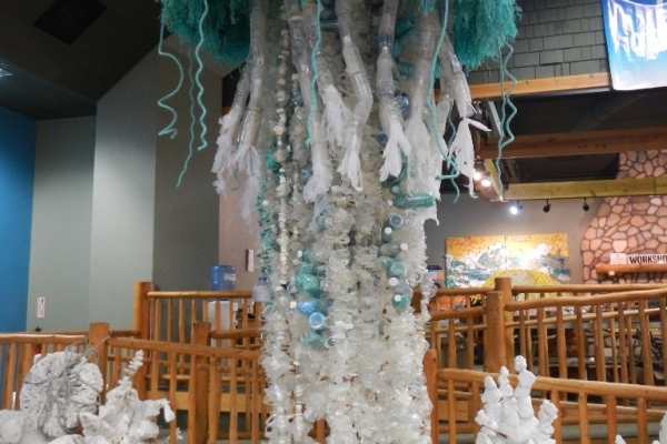 A jellyfish sculpture made of marine debris including plastic bottles.